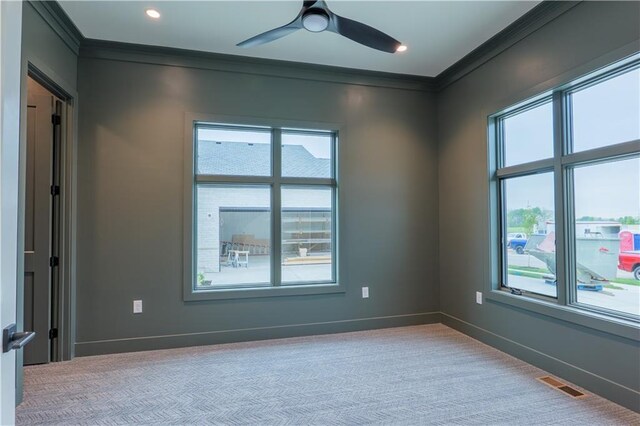 2852 W 133rd Ter, Leawood, KS 66209 - carpeted spare room featuring ornamental molding, plenty of natural light, a ceiling fan, and baseboards