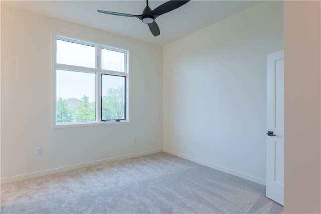 2852 W 133rd Ter, Leawood, KS 66209 - empty room with light carpet, ceiling fan, and baseboards