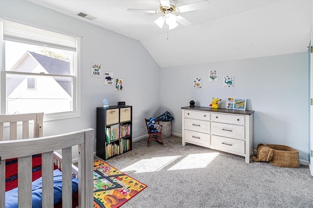 bedroom featuring ceiling fan, light colored carpet, and lofted ceiling