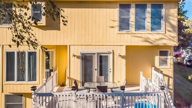 back of house with a patio area