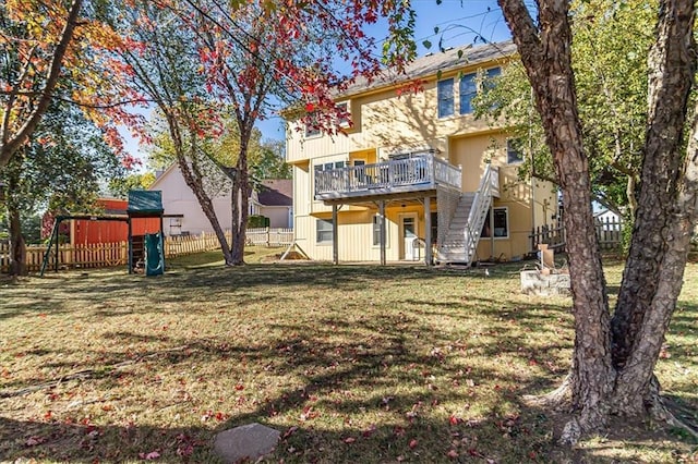 view of yard with a playground and a deck