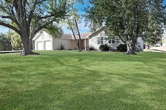 view of yard with a garage