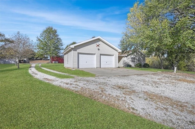 garage with a yard