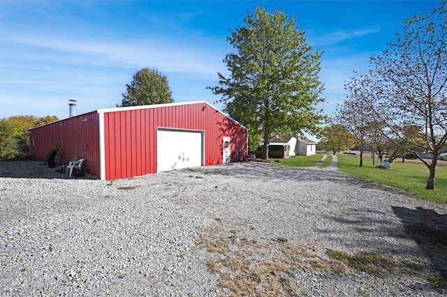 view of outdoor structure with a garage