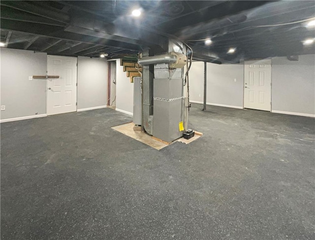 basement featuring heating unit