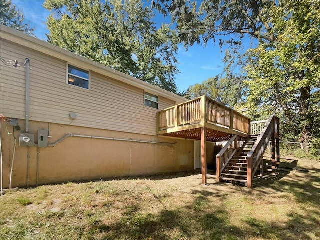 rear view of property with a deck