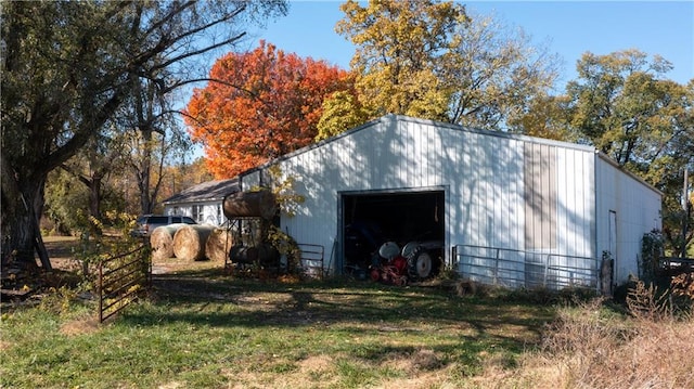 view of outbuilding with a garage