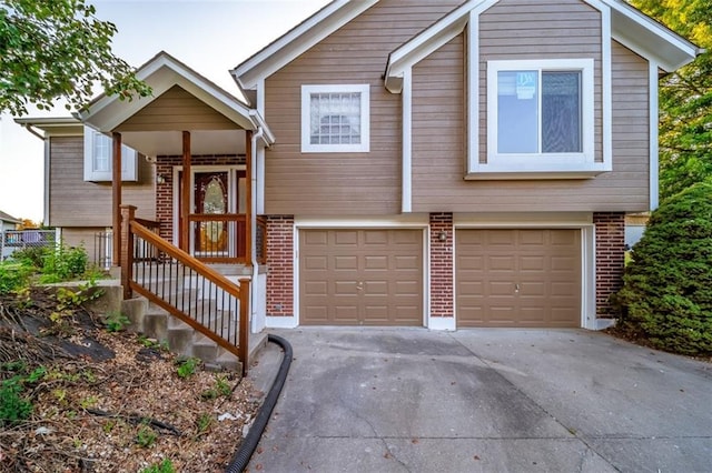 raised ranch featuring a garage