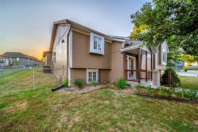 1116 N Mohican Ct, Independence, MO 64056 - view of back of property at dusk