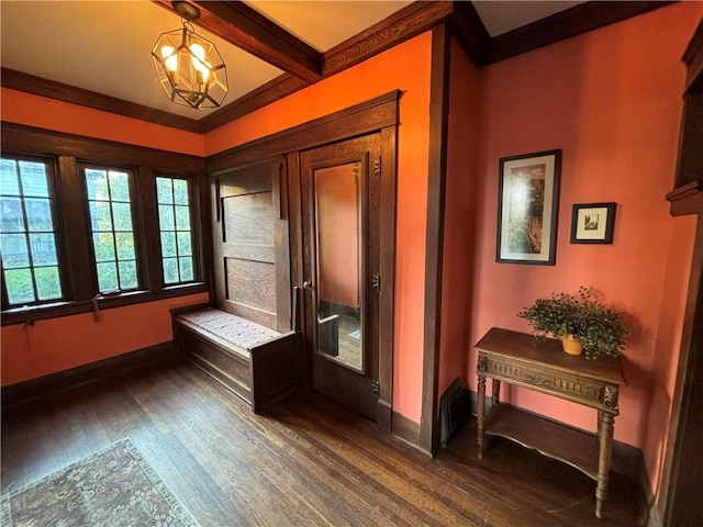 421 W Thompson St, Maryville, MO 64468 - interior space with crown molding, a chandelier, wood finished floors, and baseboards
