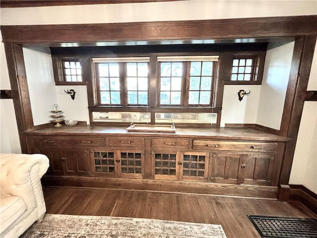 421 W Thompson St, Maryville, MO 64468 - bar with a healthy amount of sunlight and dark wood finished floors