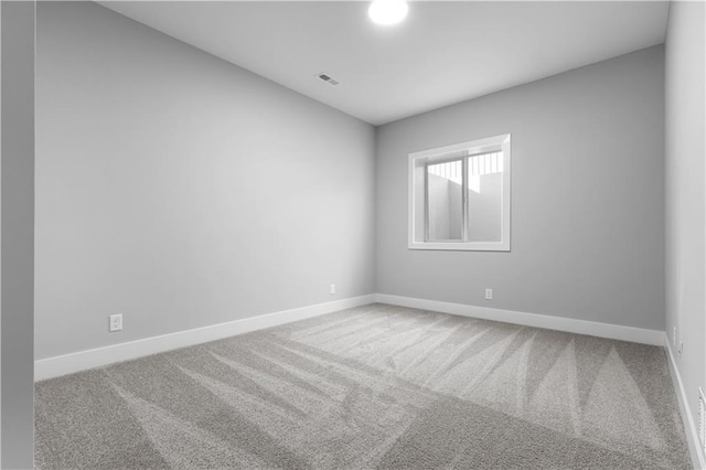 empty room featuring carpet floors