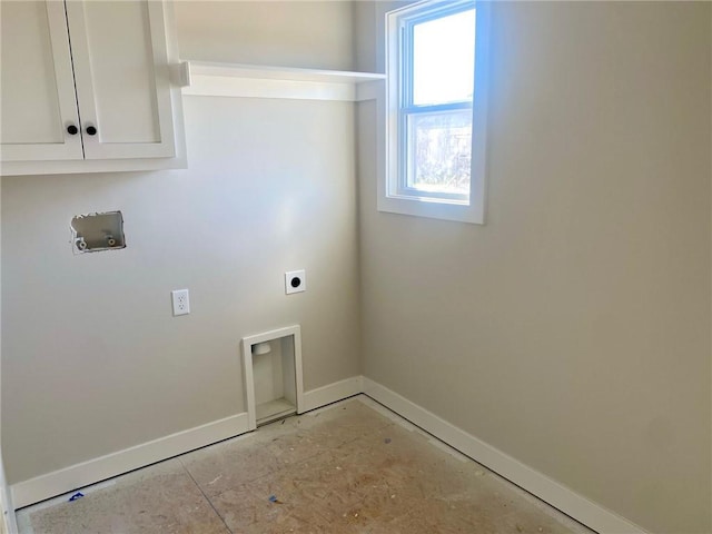 clothes washing area with cabinet space, hookup for an electric dryer, baseboards, and washer hookup