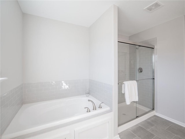 full bath with a bath, visible vents, tile patterned flooring, and a stall shower