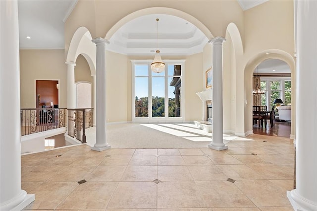 21111 W 95th Ter, Lenexa, KS 66220 - foyer entrance with tile patterned flooring, crown molding, and a towering ceiling