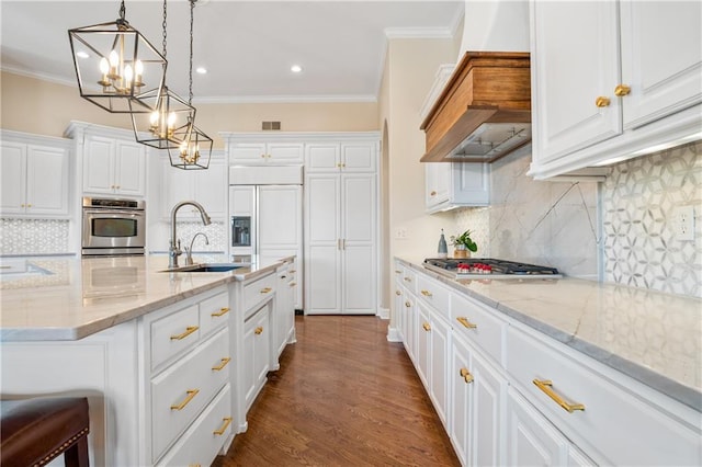 21111 W 95th Ter, Lenexa, KS 66220 - kitchen with a sink, a chandelier, stainless steel appliances, custom range hood, and crown molding
