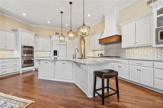 21111 W 95th Ter, Lenexa, KS 66220 - kitchen with white cabinets, built in appliances, premium range hood, and a sink