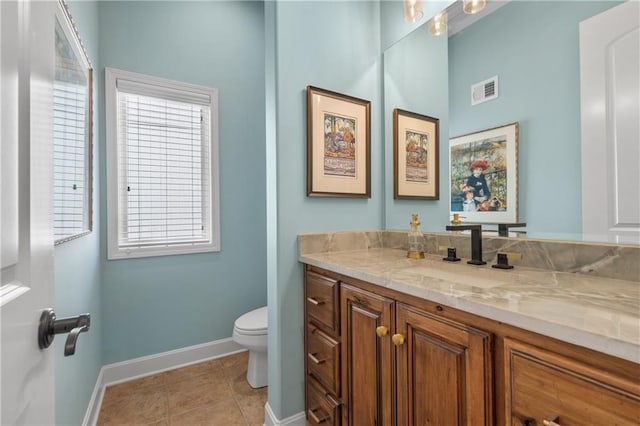 21111 W 95th Ter, Lenexa, KS 66220 - bathroom with vanity, tile patterned floors, toilet, visible vents, and baseboards