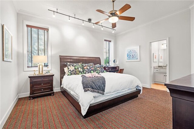 21111 W 95th Ter, Lenexa, KS 66220 - bedroom featuring rail lighting, ornamental molding, ensuite bathroom, baseboards, and a ceiling fan