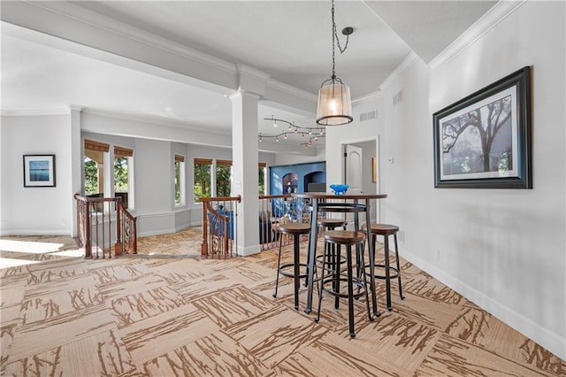 21111 W 95th Ter, Lenexa, KS 66220 - dining room featuring ornamental molding, visible vents, light colored carpet, and baseboards