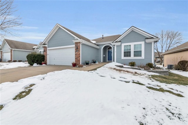 single story home with a garage