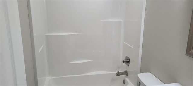 bathroom with  shower combination and toilet