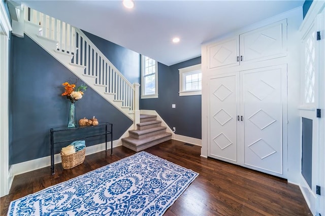 entrance foyer with dark wood-type flooring