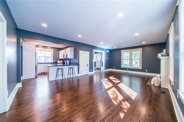 living room with dark wood-type flooring