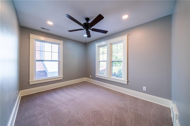 carpeted empty room with ceiling fan