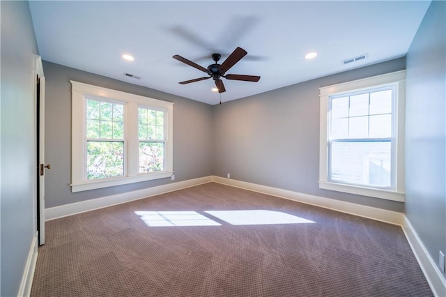 carpeted empty room with ceiling fan