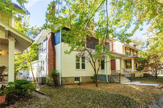 view of side of property featuring cooling unit