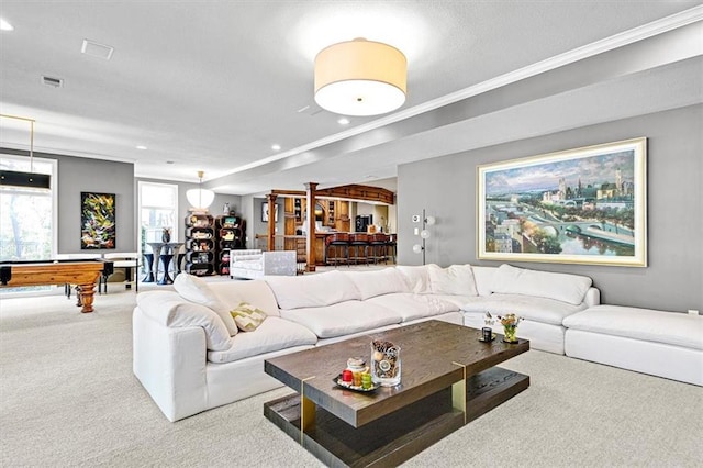 living room with crown molding, billiards, and carpet flooring