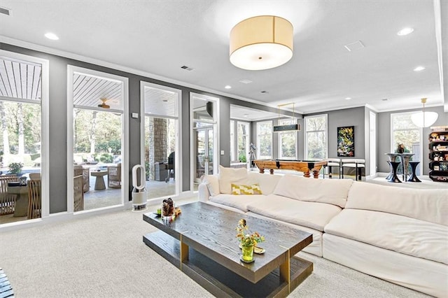 carpeted living room with crown molding, billiards, and plenty of natural light