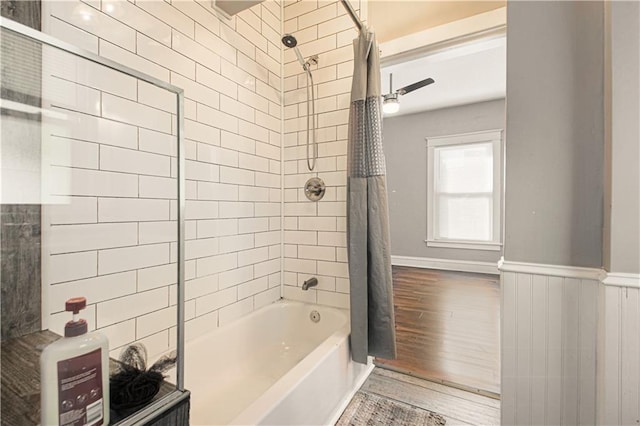 bathroom with shower / tub combo with curtain