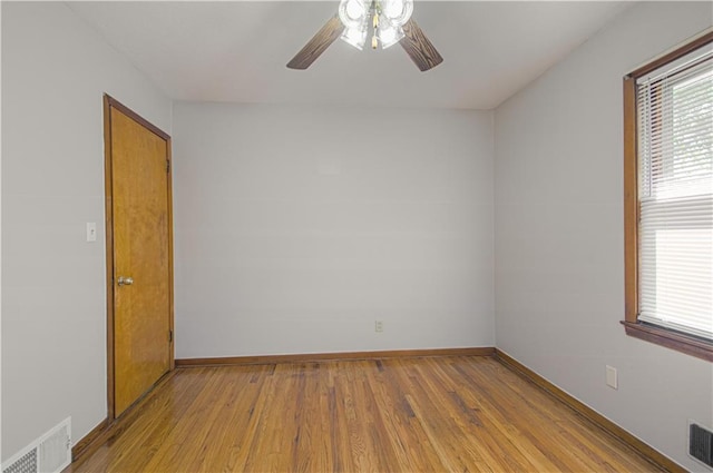 unfurnished room with light hardwood / wood-style floors and ceiling fan