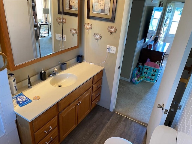 bathroom featuring vanity and hardwood / wood-style flooring