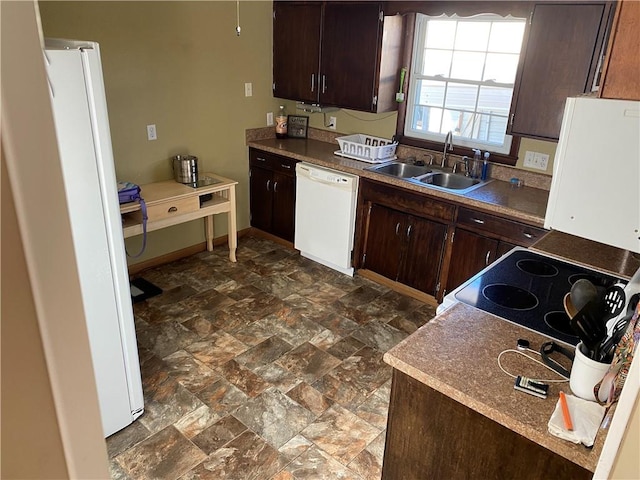 kitchen with sink, dark brown cabinets, and white appliances