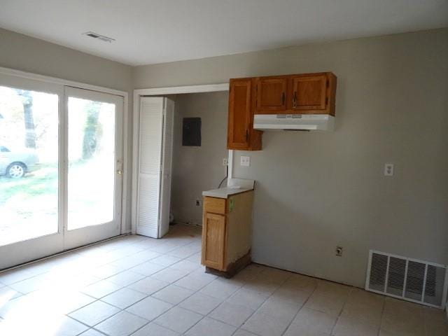 kitchen featuring light tile patterned flooring