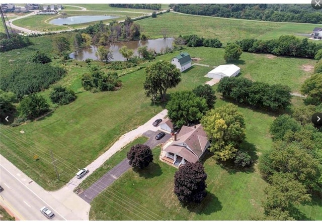 aerial view featuring a rural view and a water view