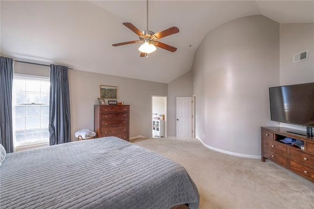 carpeted bedroom with high vaulted ceiling and ceiling fan