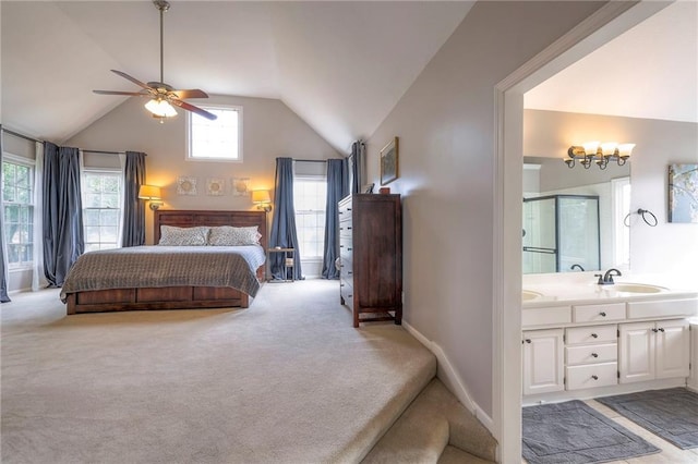 bedroom featuring light carpet, multiple windows, lofted ceiling, and ceiling fan