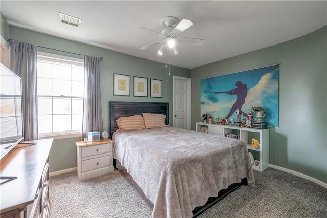 bedroom with ceiling fan and light colored carpet