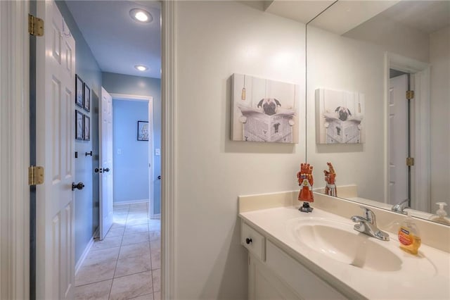 bathroom featuring vanity and tile patterned flooring