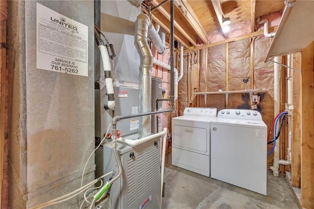 laundry room with washer and dryer