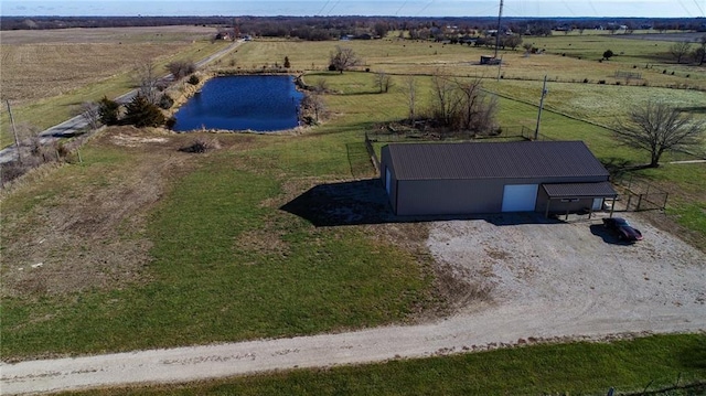 bird's eye view featuring a rural view and a water view