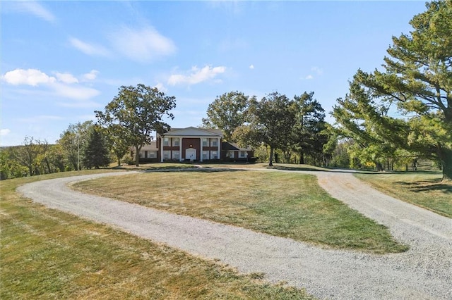 exterior space with a front lawn