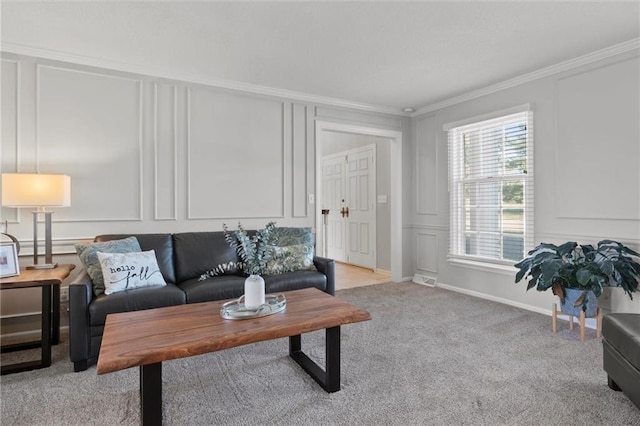 living room featuring crown molding and light colored carpet