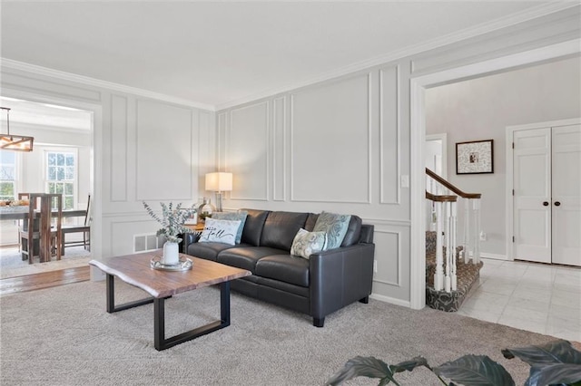 tiled living room featuring ornamental molding