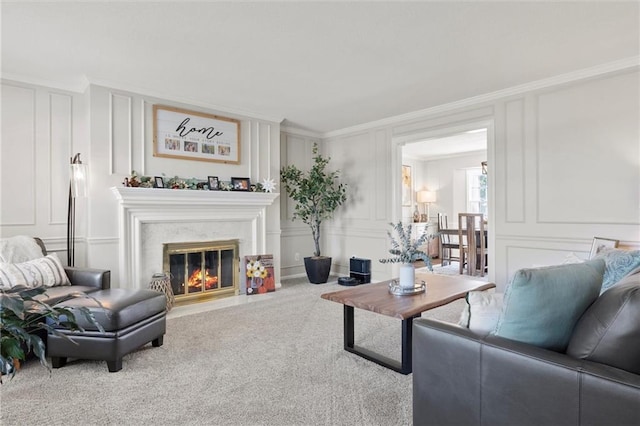 carpeted living room featuring ornamental molding