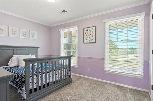 bedroom featuring crown molding and light carpet